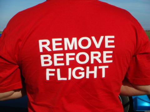 Футболка «Remove Before Flight»